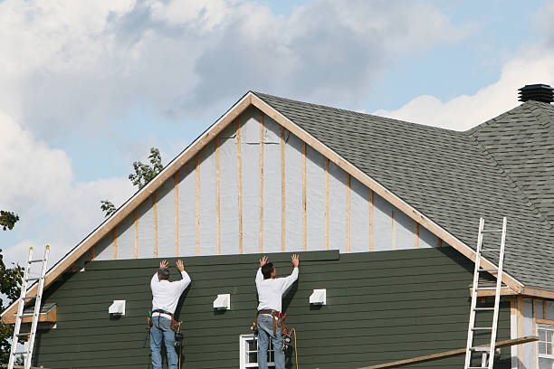 Professional Siding technician working in Hanover, MD